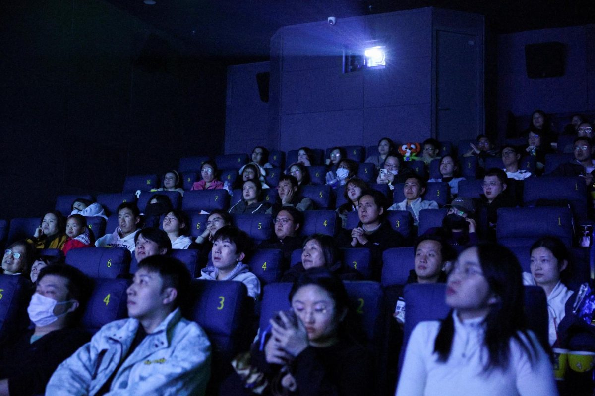 Moviegoers watch Zootopia 2 at a movie theater on the film's release day in Shanghai, China, November 26, 2025. REUTERS/Go Nakamura